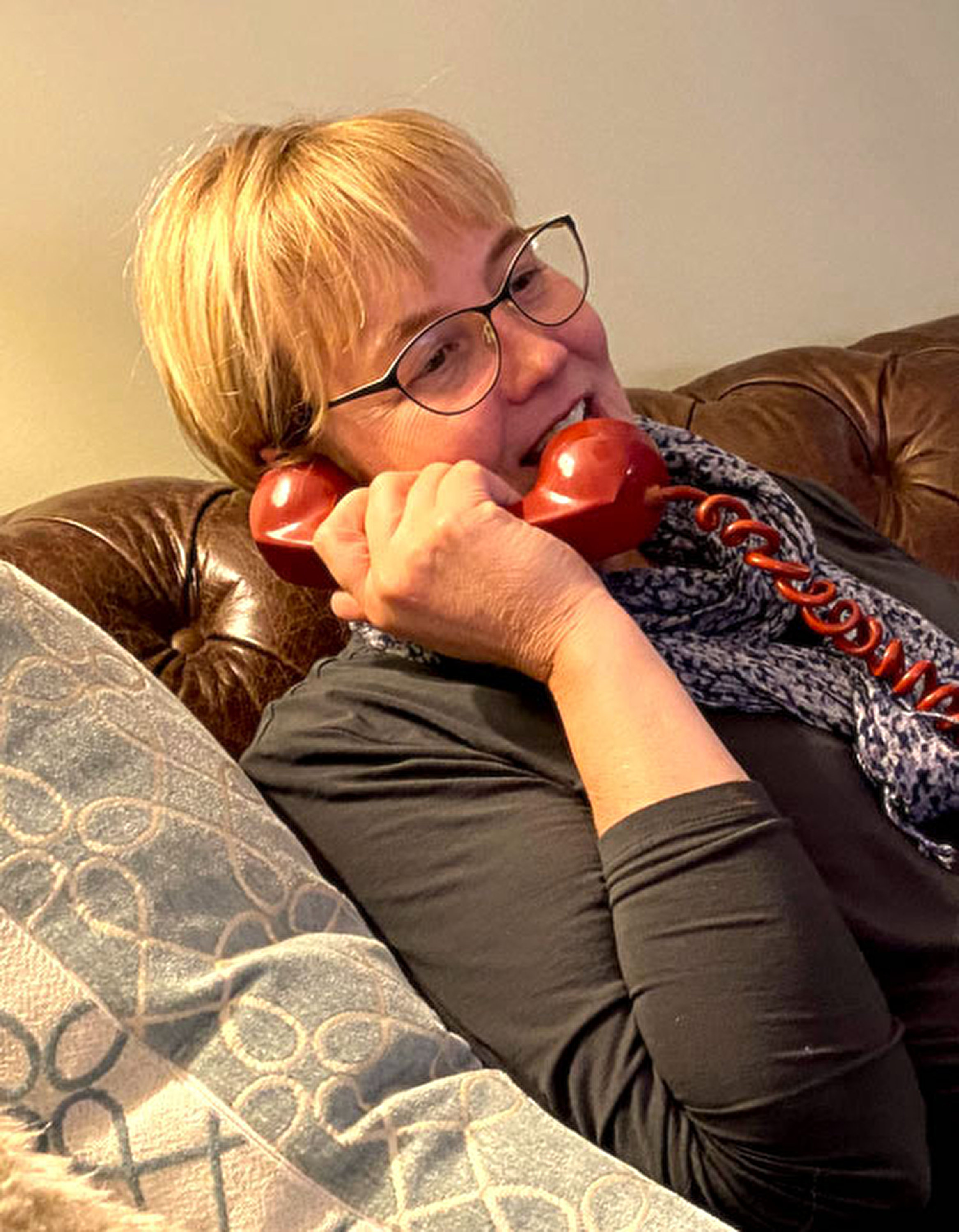 Bobbie on a red phone